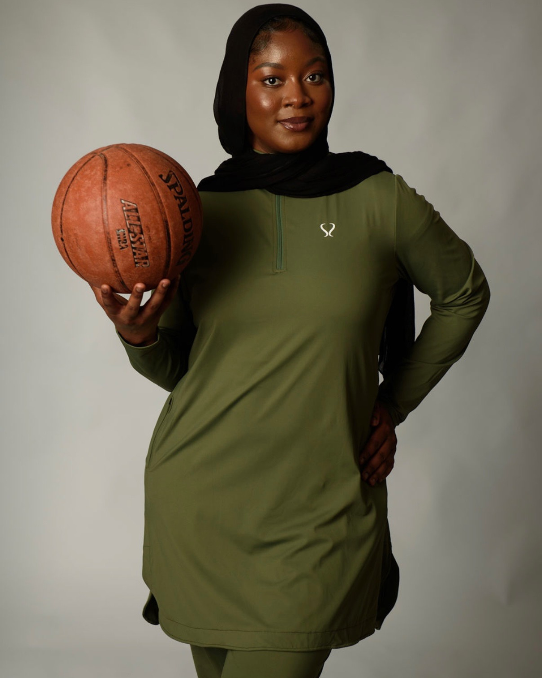 Camiseta holgada deportiva para mujer con cremallera ¼ verde oliva
