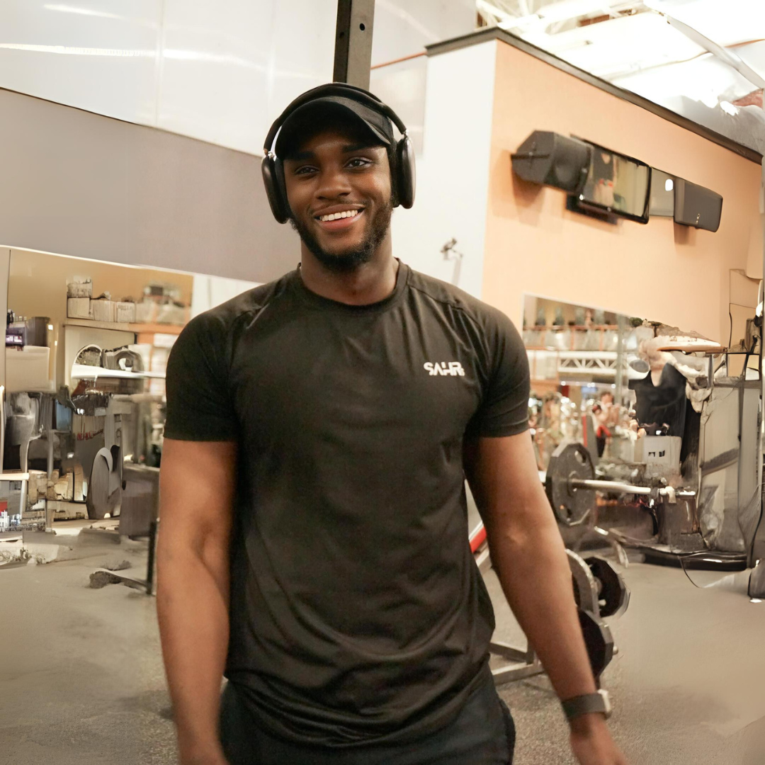 Man wearing black short sleeve shirt