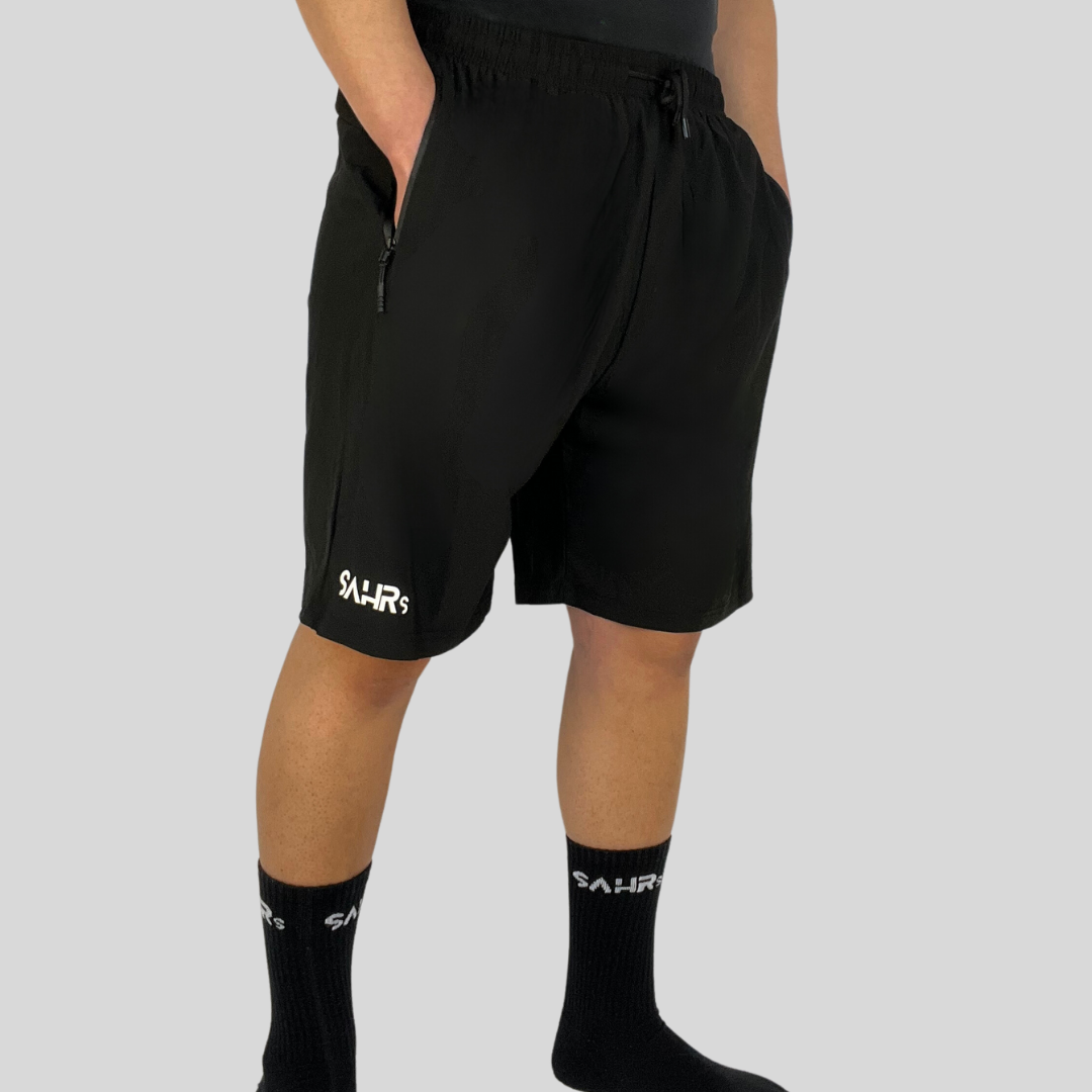 Lightweight black mens shorts with double size zipper pockets, elastic waist, & drawstring