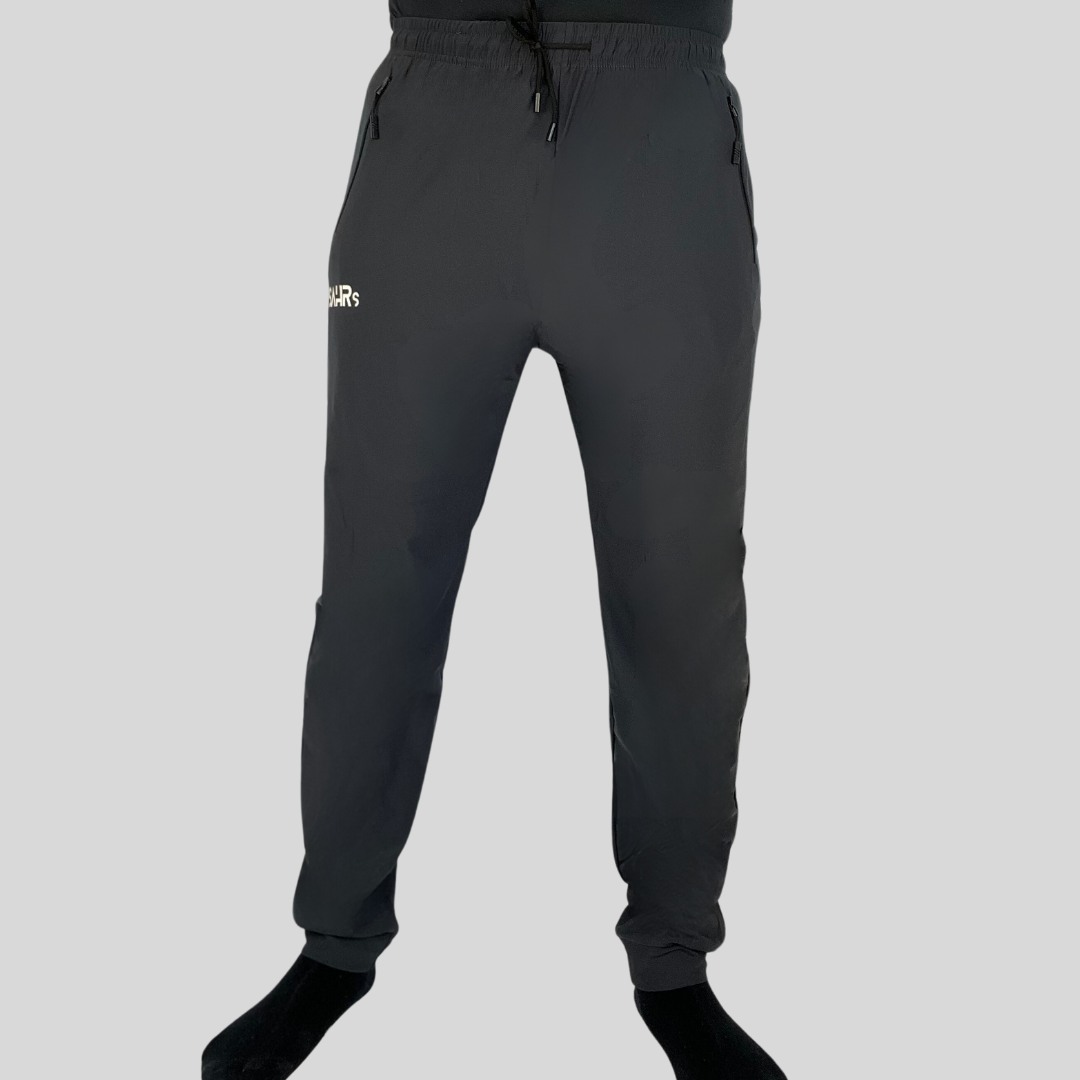 Lightweight gray pants with double side zipper pockets, elastic waist, & drawstring