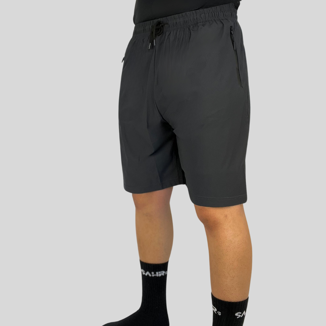 Lightweight gray mens shorts with double size zipper pockets, elastic waist, & drawstring