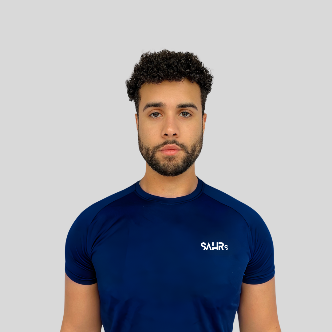 Lightweight mens blue short sleeve shirt with breathable fabric, moisture wicking technology, and curved bottom hem