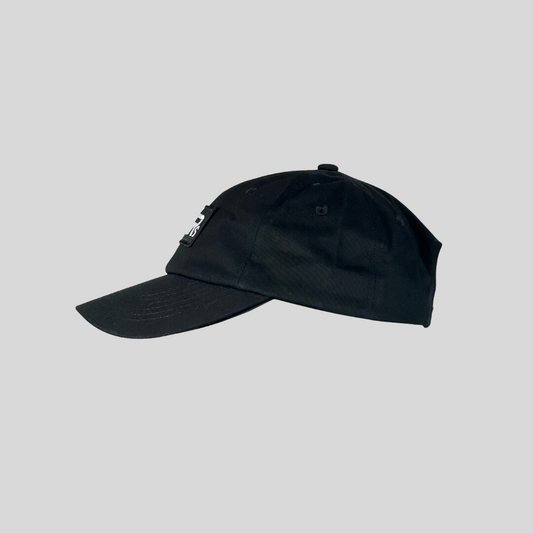 unisex black cap, with comfort and flexibility, featuring an adjustable strap