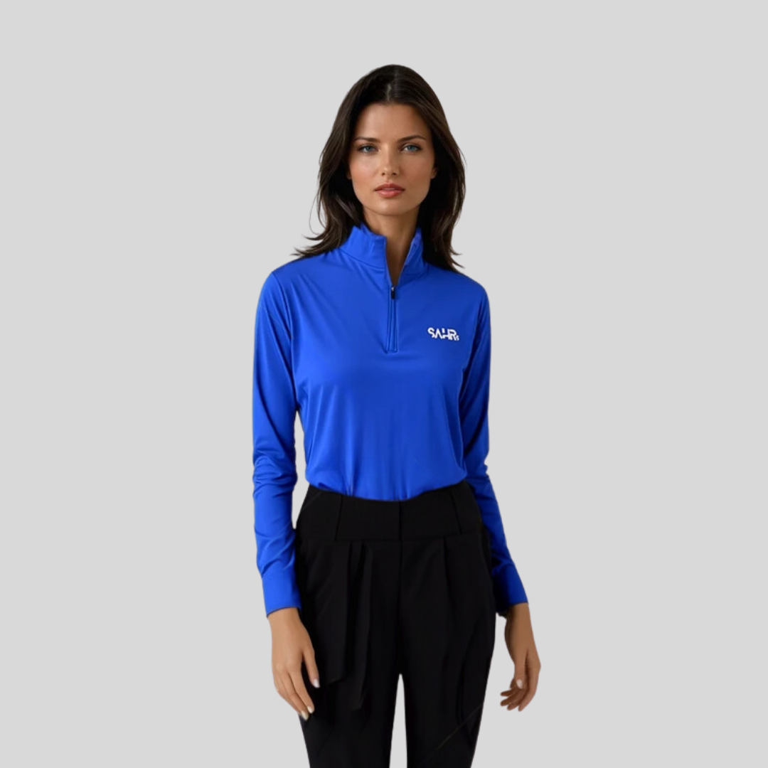 Women's blue fitted top tucked in