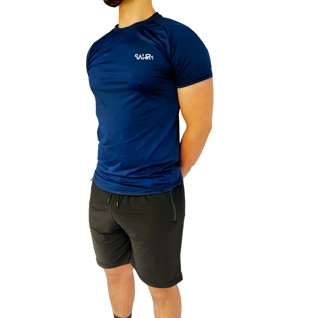 Lightweight mens blue short sleeve shirt with breathable fabric, moisture wicking technology, and curved bottom hem