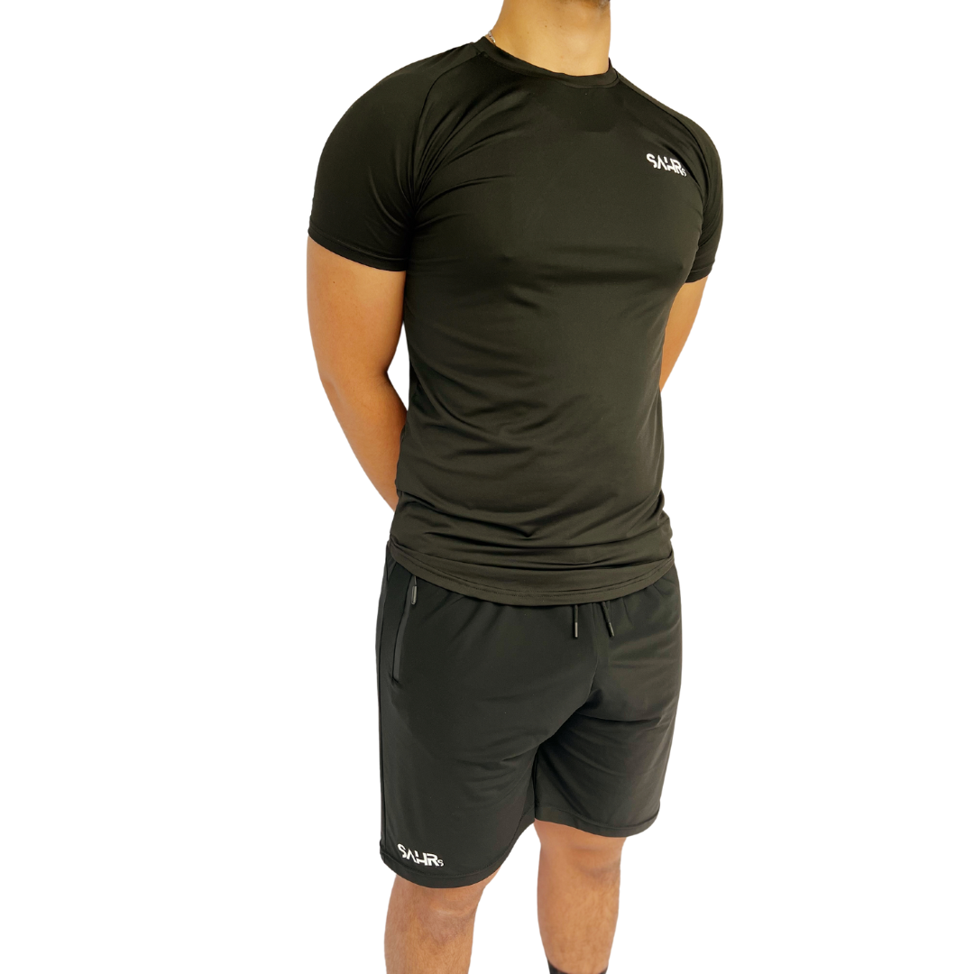 Lightweight mens black short sleeve shirt with breathable fabric, moisture wicking technology, and curved bottom hem